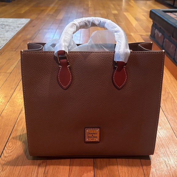 Brand new Dooney & Bourke Brown Pebble Leather Structured Tote with Red Accens